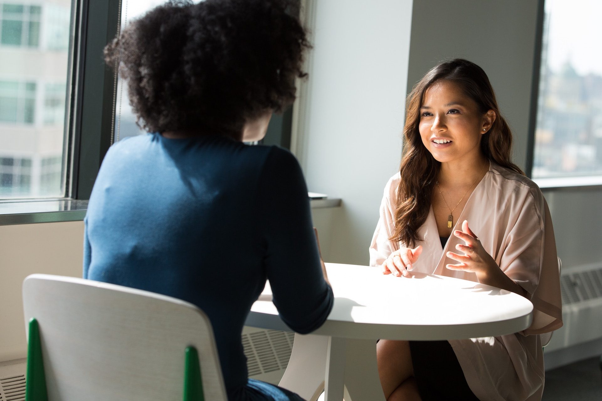 Two women in a meeting together